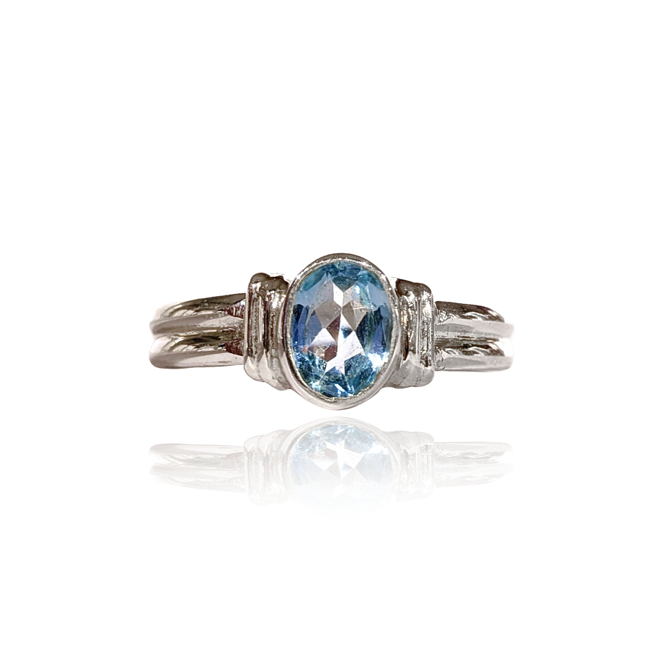 Radiant Blue Topaz twin band sterling silver ring