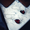 Garnet faceted tear drop shape silver earrings